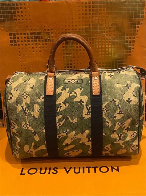 camouflage louis vuitton duffle bag|Louis Vuitton camo backpack.